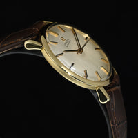 OMEGA | Automatic Anno 1961, Oro giallo 18 kt., carica automatica Calibro 552, 34 mm.