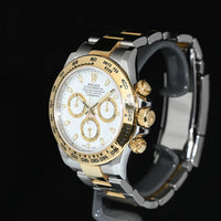 ROLEX | DAYTONA Cosmograph Ref. 116503 Box and papers, 2018 Steel and yellow gold, White dial