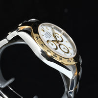 ROLEX | DAYTONA Cosmograph Ref. 116503 Box and papers, 2018 Steel and yellow gold, White dial