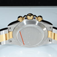 ROLEX | DAYTONA Cosmograph Ref. 116503 Box and papers, 2018 Steel and yellow gold, White dial