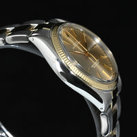 Rolex | Oyster Perpetual Ref. 1005 from 1974 Steel and Yellow Gold 34 mm.