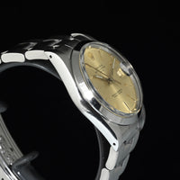 Rolex | Oyster Perpetual DATE Quadrante champagne Automatico, Acciaio, 34 mm. Ref. 15000 Scatola e garanzia Rolex 1989