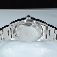 Rolex | Oyster Perpetual DATE Quadrante champagne Automatico, Acciaio, 34 mm. Ref. 15000 Scatola e garanzia Rolex 1989