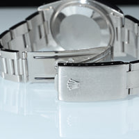 Rolex | Oyster Perpetual DATE Quadrante champagne Automatico, Acciaio, 34 mm. Ref. 15000 Scatola e garanzia Rolex 1989