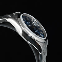 Rolex | Oyster Perpetual Date Ref. 15200, 34 mm, steel, blue dial, Year 1996