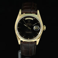 Rolex | Oyster Perpetual Day-Date Ref. 18038 Black dial Oro giallo 18 Kt. Scatola Rolex 1979