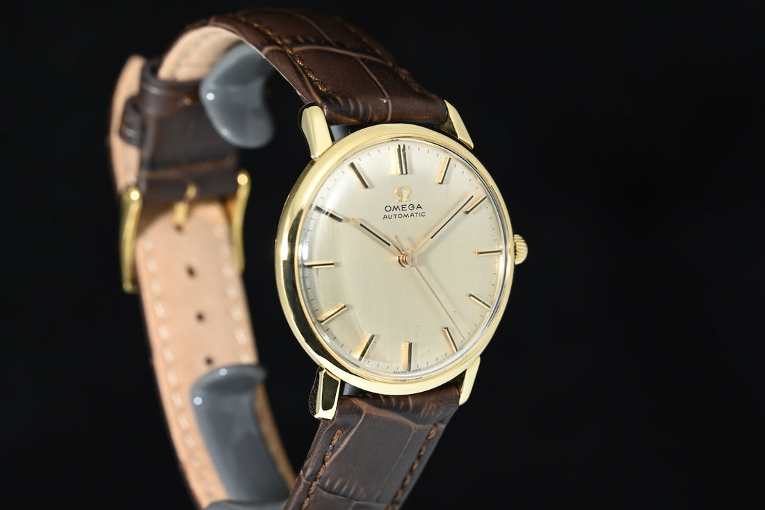 OMEGA | Automatic Anno 1961, Oro giallo 18 kt., carica automatica Calibro 552, 34 mm.