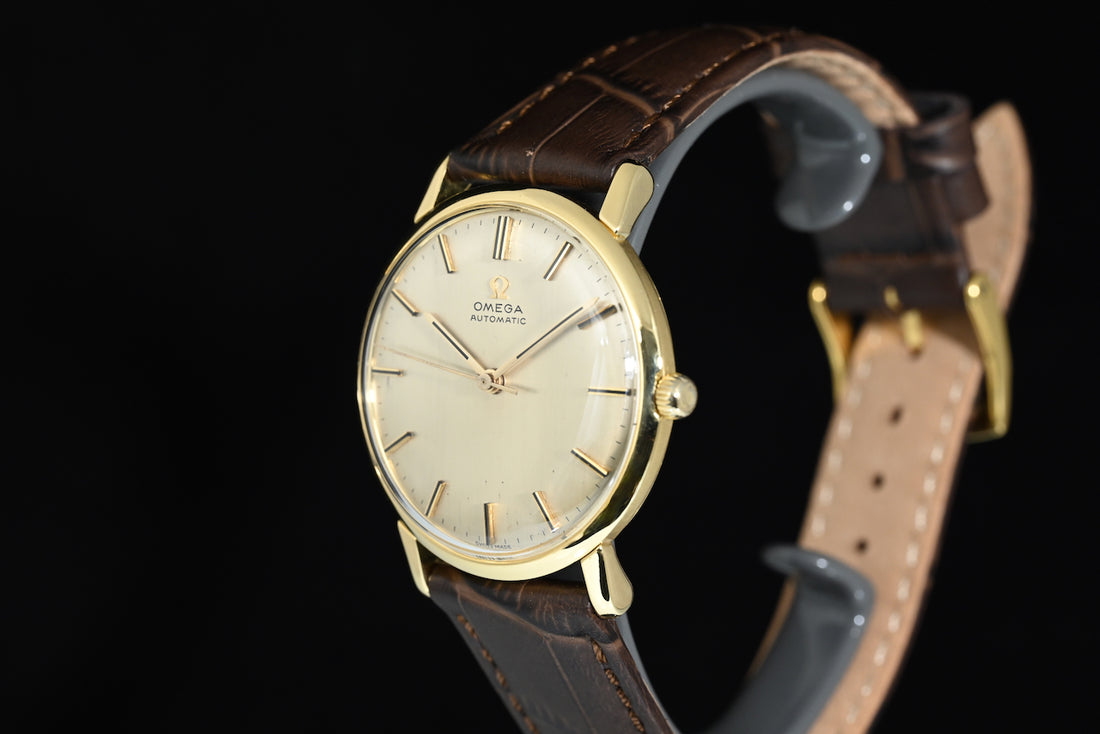 OMEGA | Automatic Anno 1961, Oro giallo 18 kt., carica automatica Calibro 552, 34 mm.