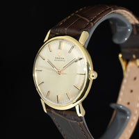 OMEGA | Automatic Anno 1961, Oro giallo 18 kt., carica automatica Calibro 552, 34 mm.