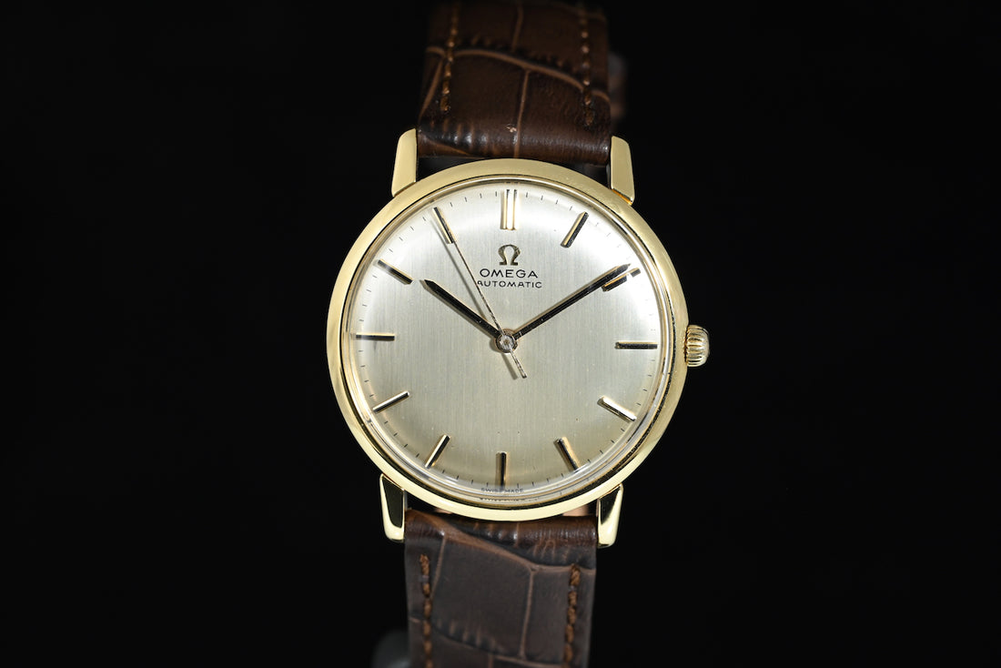 OMEGA | Automatic Anno 1961, Oro giallo 18 kt., carica automatica Calibro 552, 34 mm.