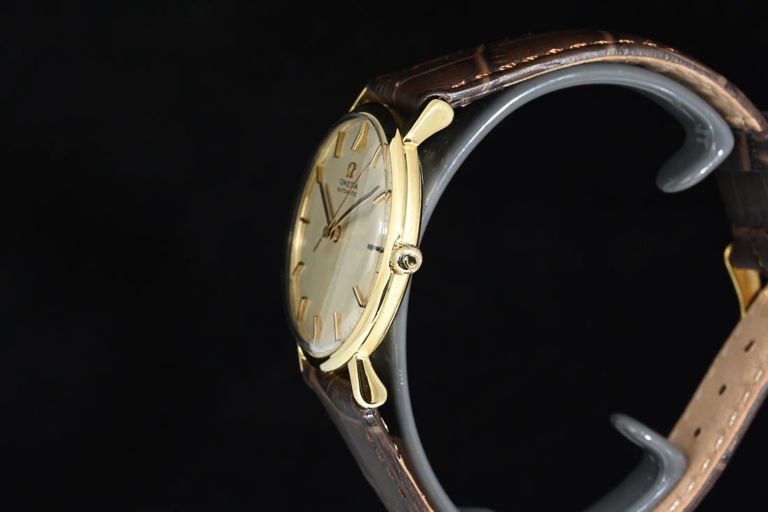 OMEGA | Automatic Anno 1961, Oro giallo 18 kt., carica automatica Calibro 552, 34 mm.