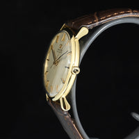 OMEGA | Automatic Anno 1961, Oro giallo 18 kt., carica automatica Calibro 552, 34 mm.