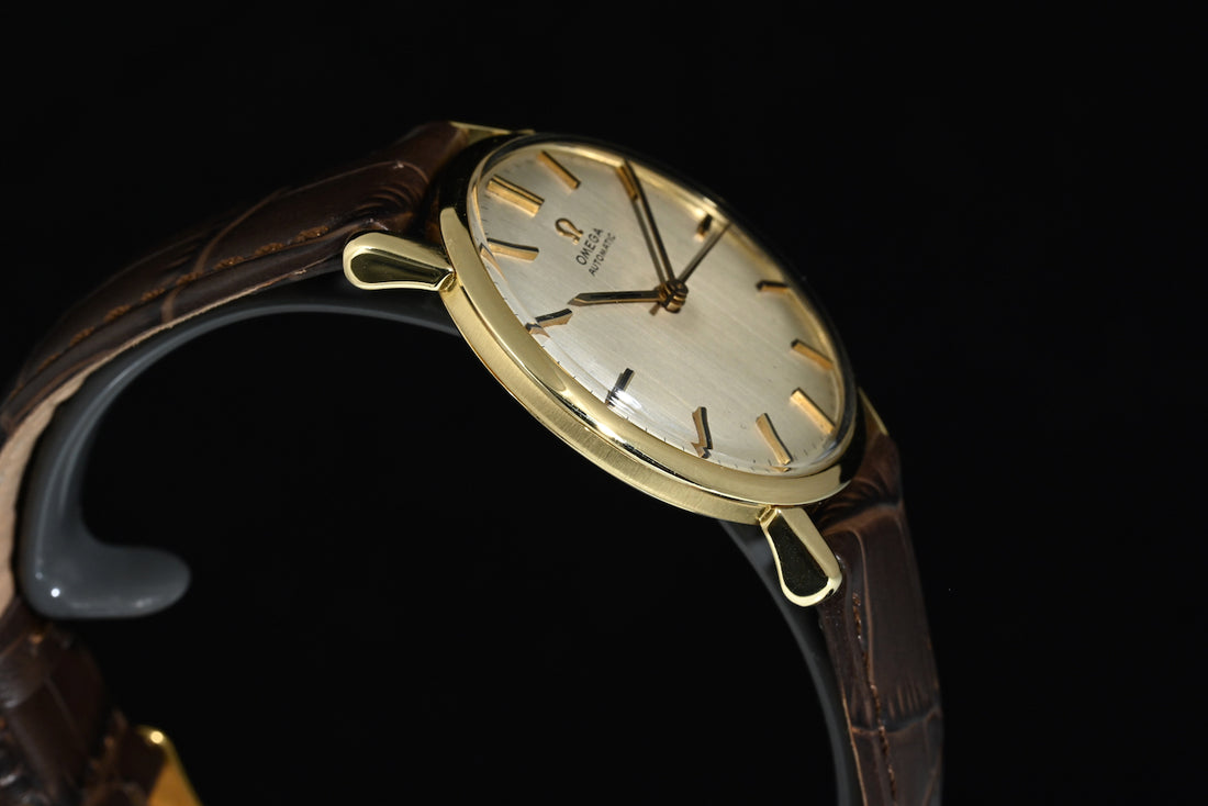 OMEGA | Automatic Anno 1961, Oro giallo 18 kt., carica automatica Calibro 552, 34 mm.