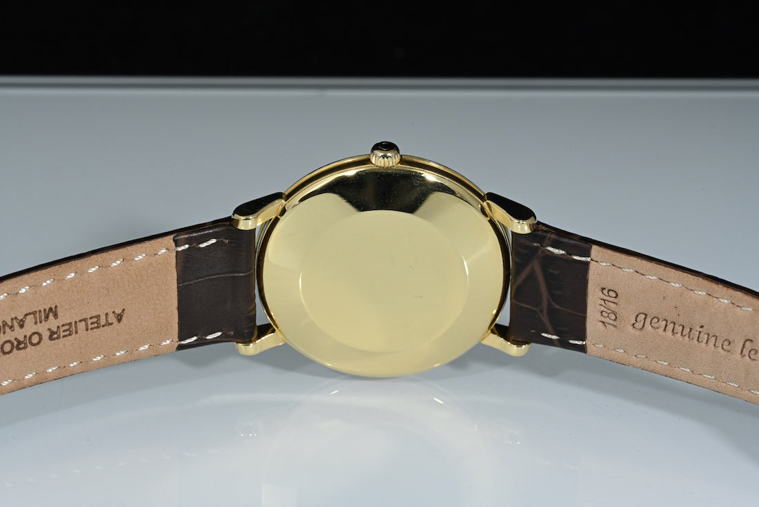 OMEGA | Automatic Anno 1961, Oro giallo 18 kt., carica automatica Calibro 552, 34 mm.