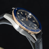 OMEGA | SEAMASTER 300 Master Co-Axial Chronometer, Titanium-Sedna Gold, 41 mm. Ref. Box and Papers, 2018
