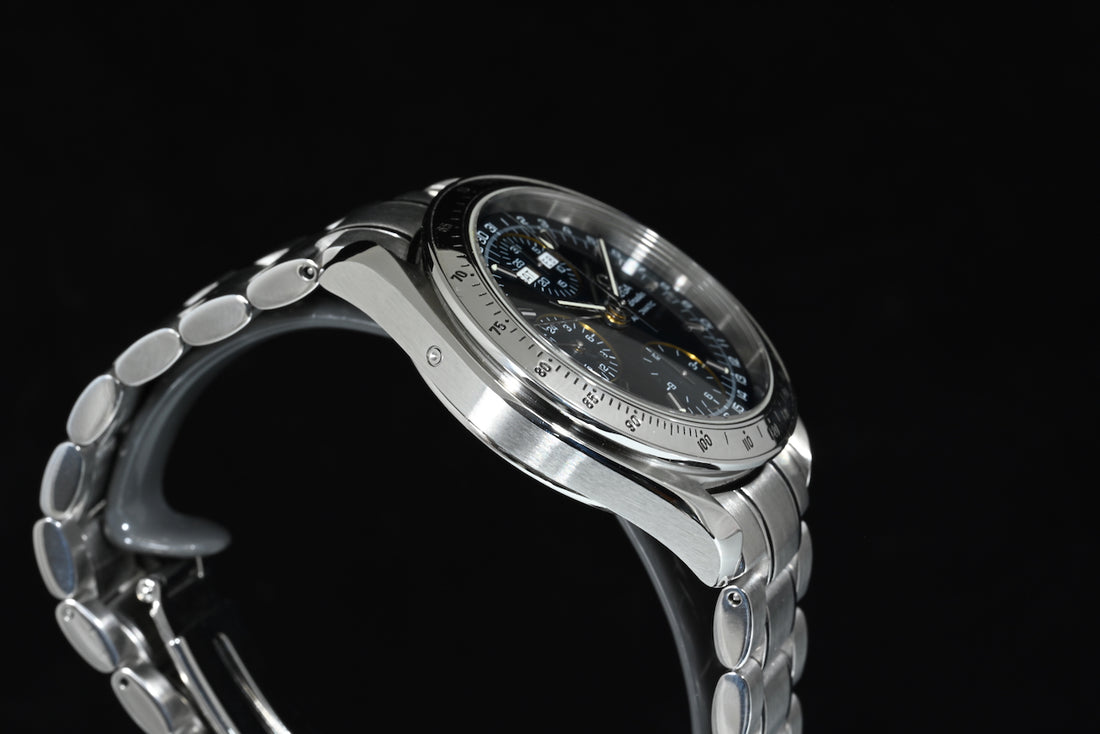 OMEGA | Speedmaster Triple date Chronograph, Ref. 3523.80.00, Steel, 39 mm.