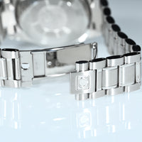 OMEGA | Speedmaster Triple date Chronograph, Ref. 3523.80.00, Steel, 39 mm.