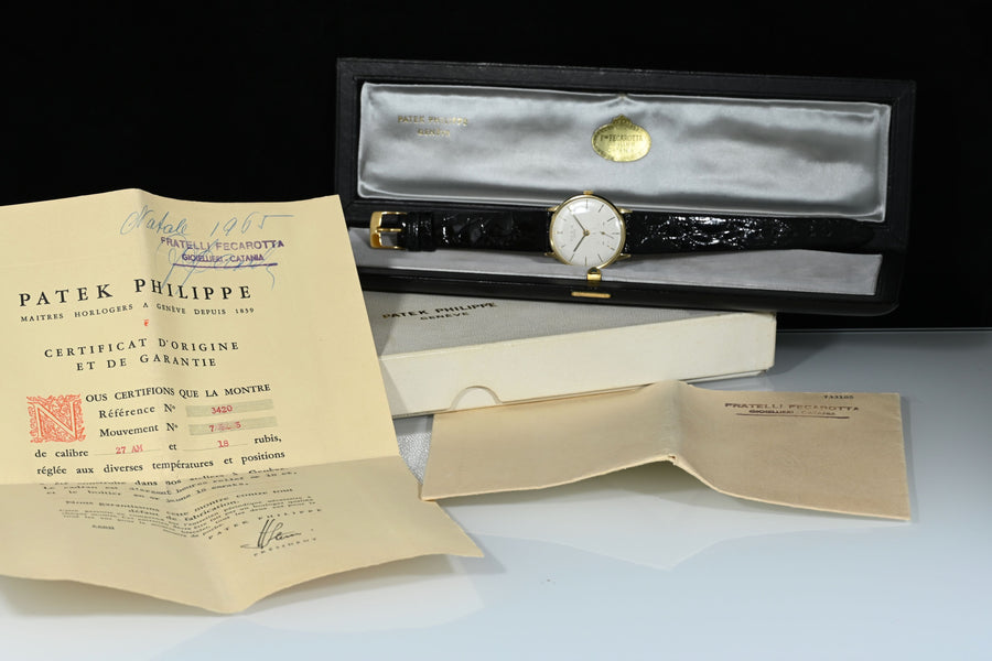 PATEK PHILIPPE | CALATRAVA 18K Yellow Gold, 34 mm. Manual Winding. Year 1965. Patek Philippe Box and Papers.