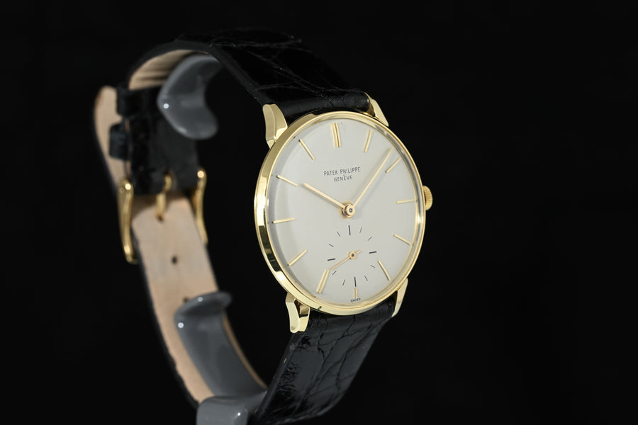 PATEK PHILIPPE | CALATRAVA 18K Yellow Gold, 34 mm. Manual Winding. Year 1965. Patek Philippe Box and Papers.