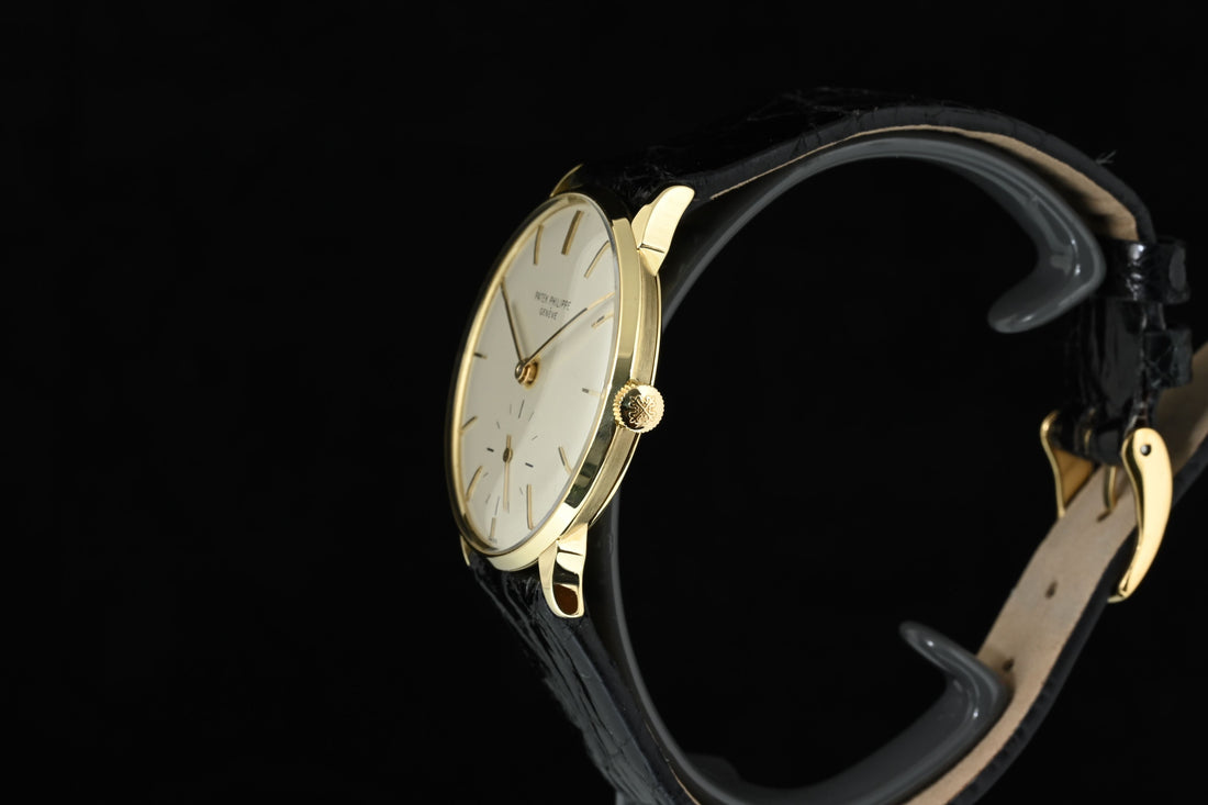 PATEK PHILIPPE | CALATRAVA 18K Yellow Gold, 34 mm. Manual Winding. Year 1965. Patek Philippe Box and Papers.