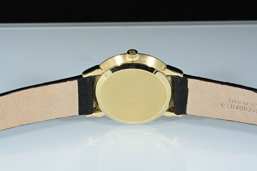 PATEK PHILIPPE | CALATRAVA 18K Yellow Gold, 34 mm. Manual Winding. Year 1965. Patek Philippe Box and Papers.