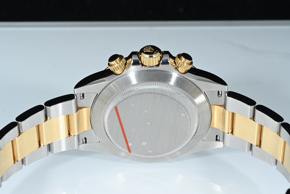 ROLEX | DAYTONA Cosmograph Ref. 116503 Box and papers, 2018 Steel and yellow gold, White dial