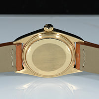 ROLEX | Oyster Perpetual DAY-DATE Yellow gold/leather 36 mm. Ref. 1803 from 1975
